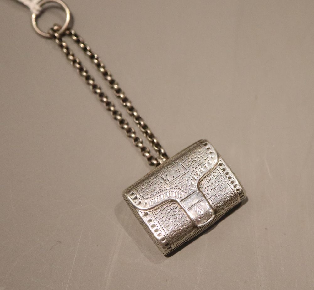 A George III engraved silver vinaigrette, modelled as a satchel, John Shaw, Birmingham, 1816, 27mm
